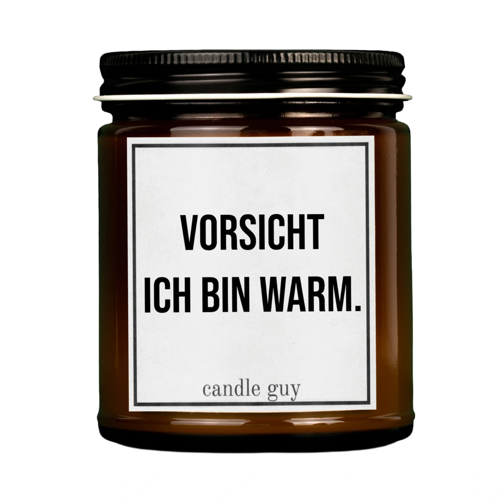 Braune Kerze mit Spruch "Vorsicht ich bin warm." im Studio