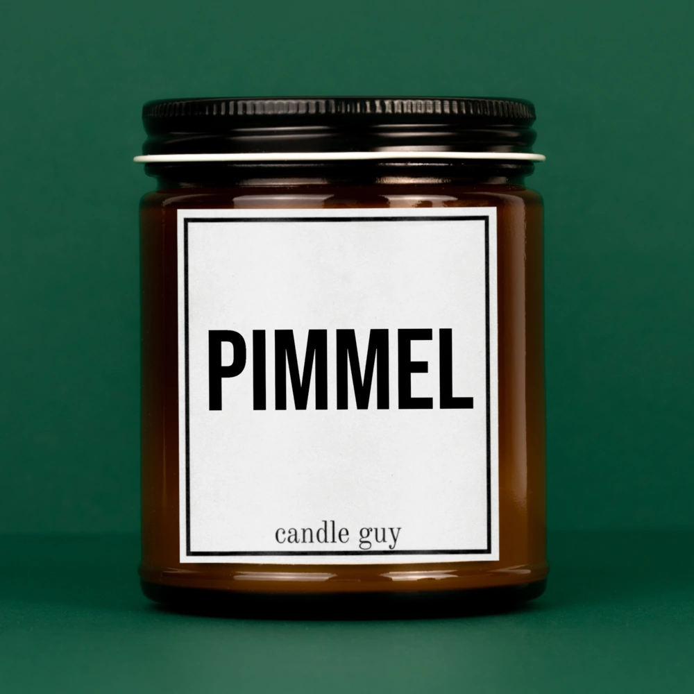 Brennende braune Kerze mit Spruch "Pimmel"