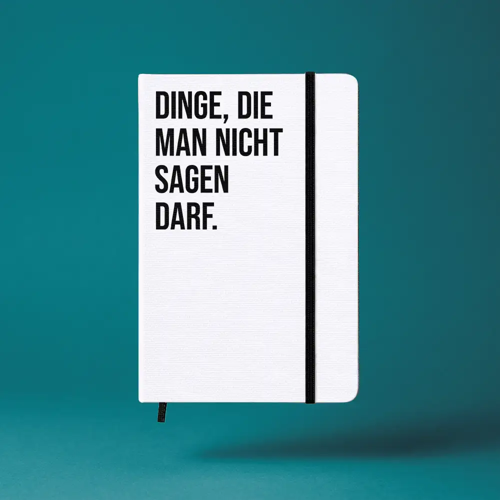 Notizbuch mit Aufdruck „DINGE