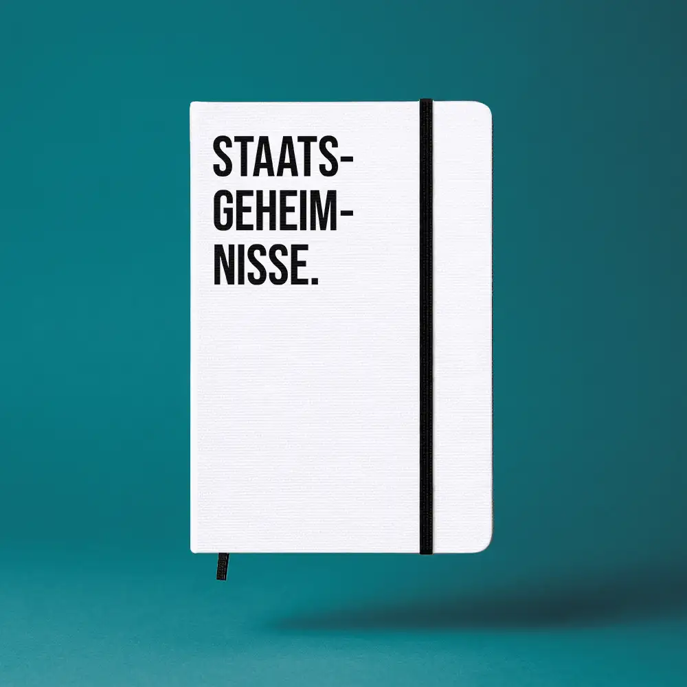 Notizbuch mit Aufdruck „STAATSGEHEIMNISSE” – A5 Hardcover mit Gummiband