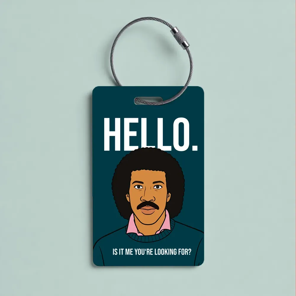 Illustrated dark-teal tag with a man’s portrait and the text 'HELLO.' and 'Is it me you’re looking for?'