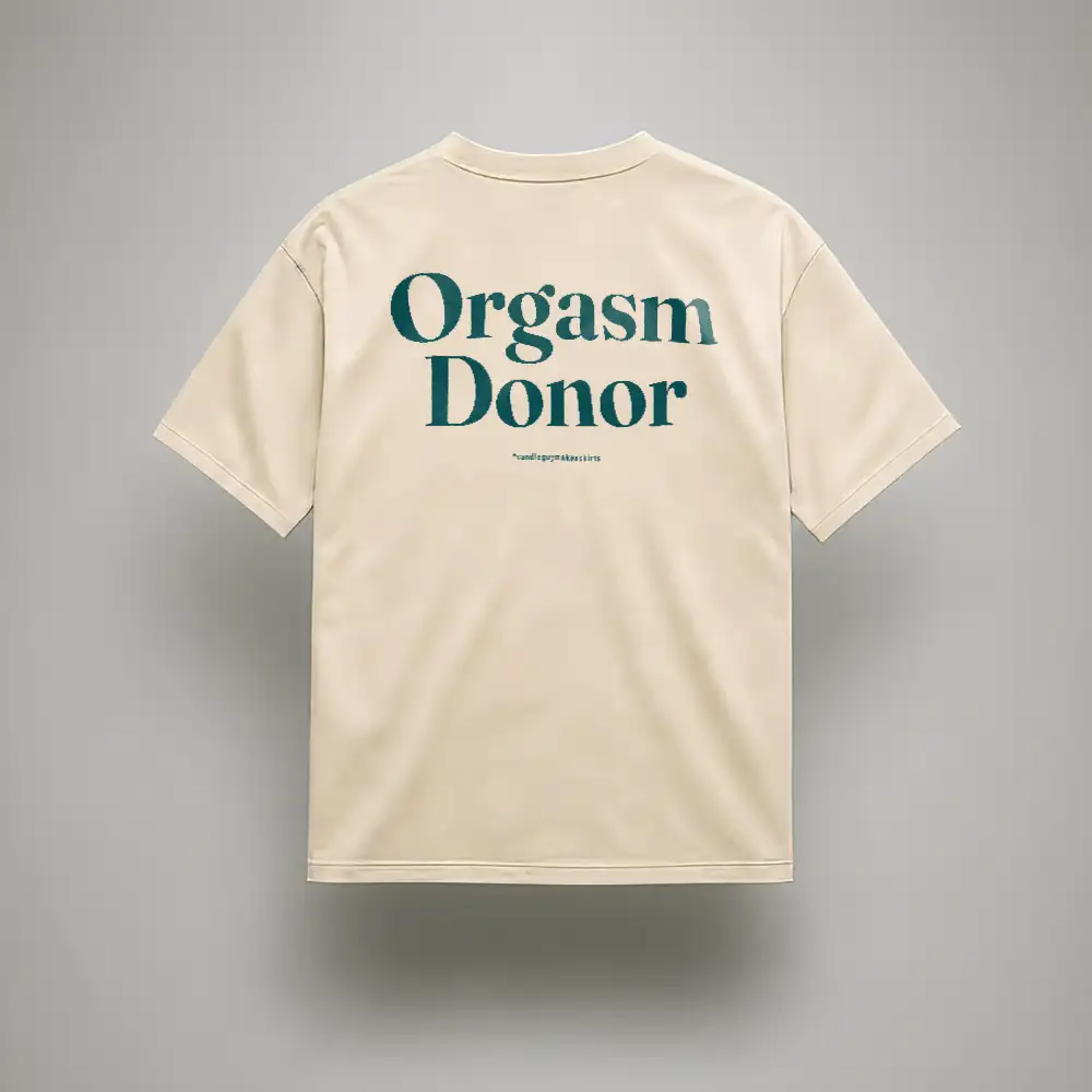 Beige short-sleeve T-shirt shown from the back with teal text saying 'Orgasm Donor'
