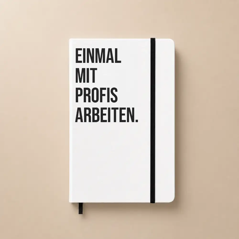 Notizbuch mit dem Spruch „Einmal mit Profis arbeiten“